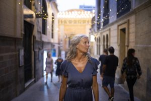 beautiful-mature-woman-spending-time-around-city