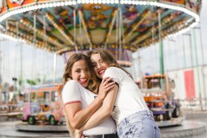 happy-young-friends-amusement-park