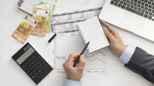 top-view-business-man-checking-finance-manners